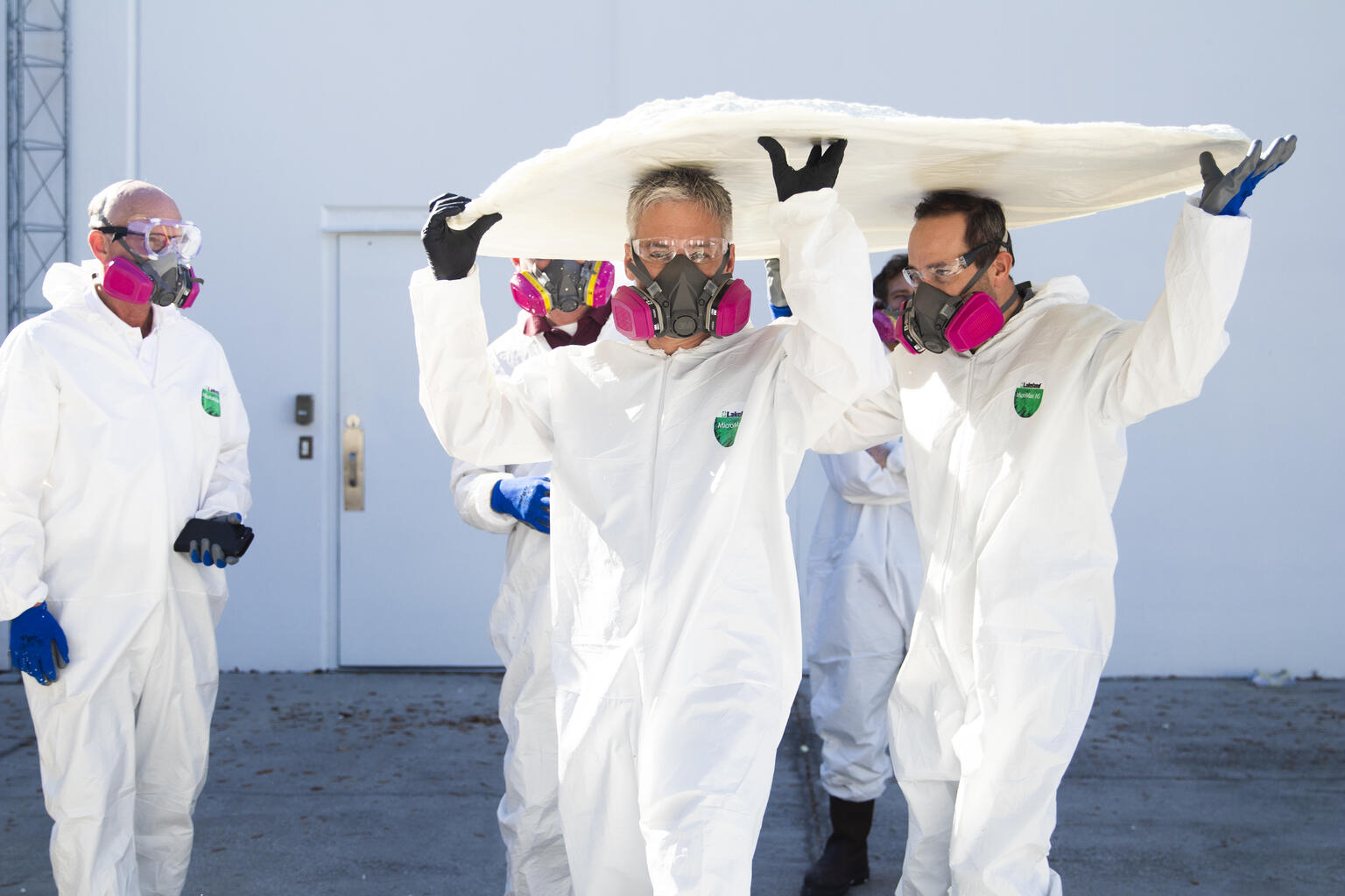 koala training employees dressed in protective gear